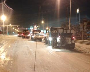 Plow trucks on Capital Avenue SW